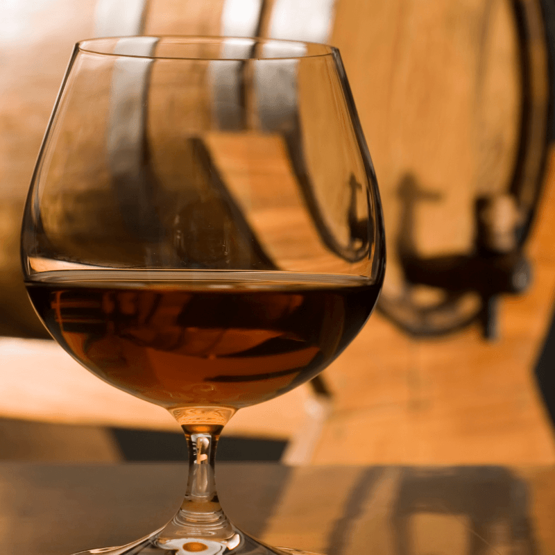 Glass of rum that has been  temperately aged